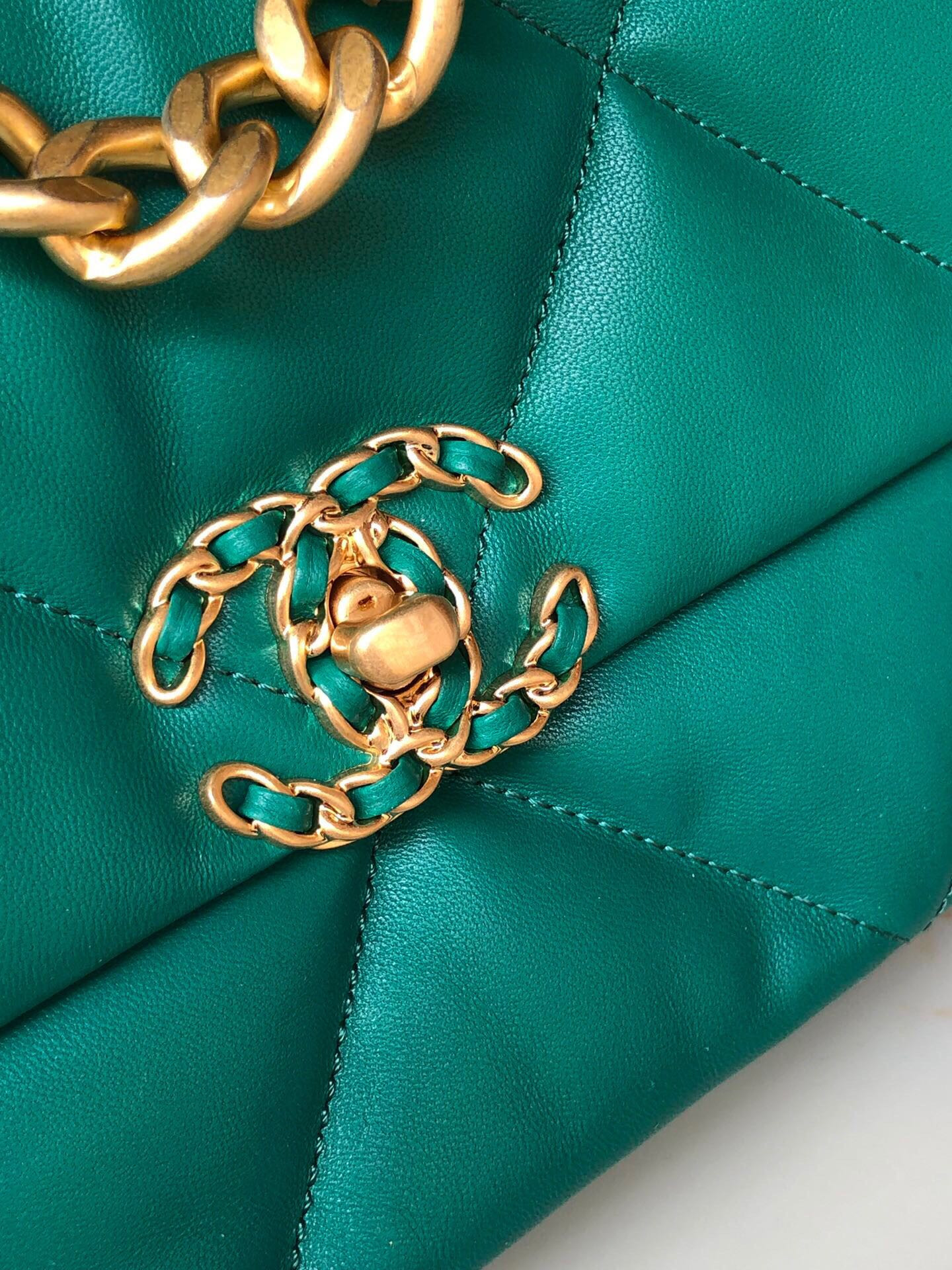 Ch*el 19 handbag shiny leather, gold-tone, silver-tone & ruthenium-finish metal green 6.2 × 10.1 × 3.5 in