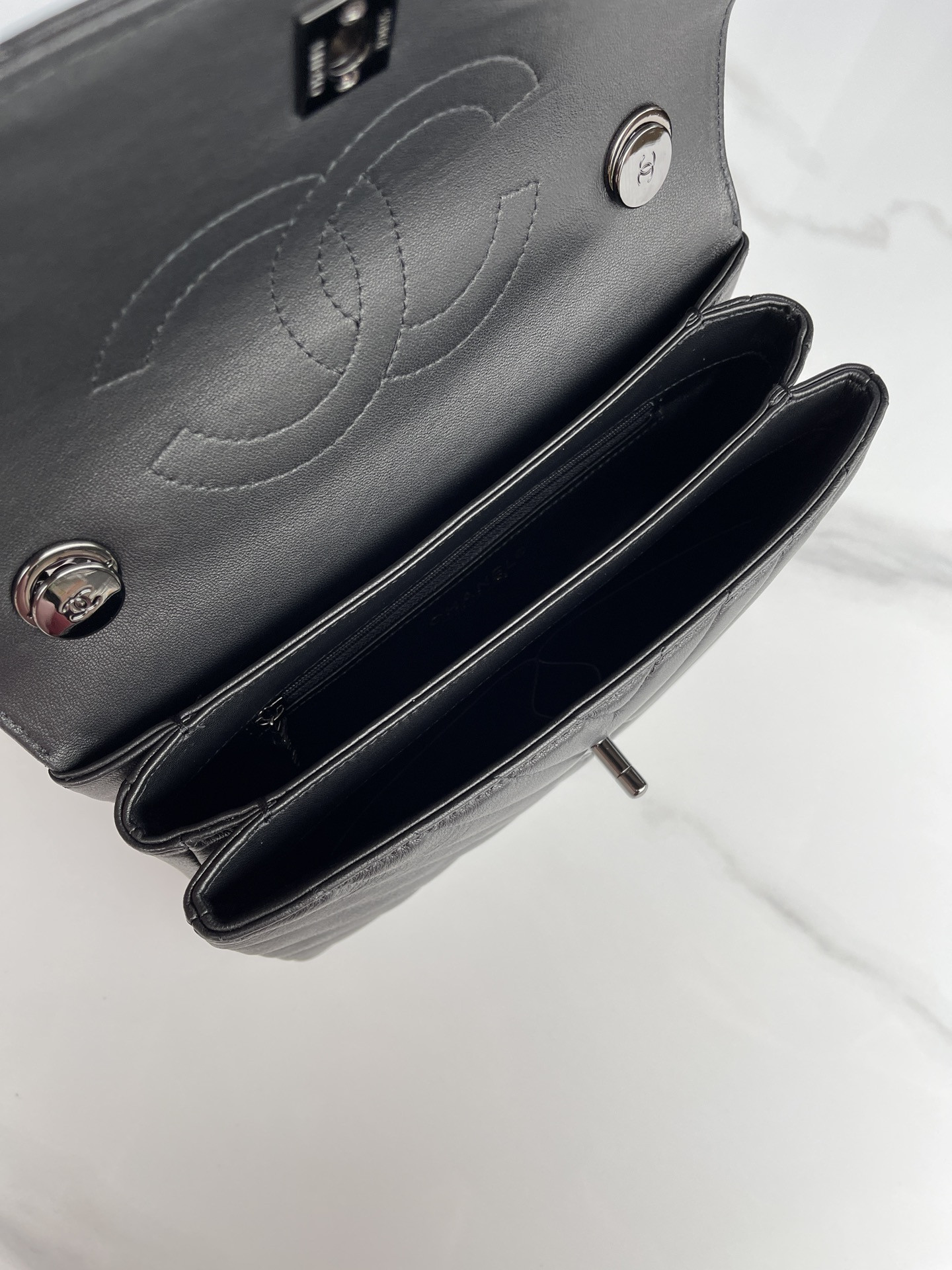 Ch*el flap bag with top handle 6.6 × 9.8 × 4.7 in