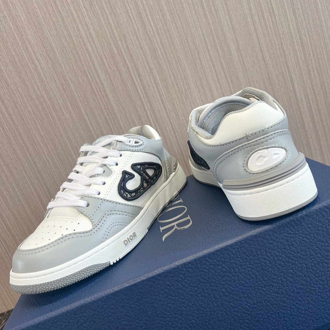 ua D*or b57 low-top sneaker gray and white