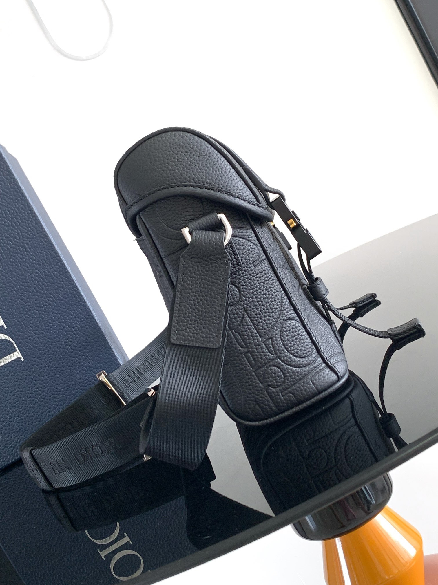 D*or hit the road messenger bag with flap black D*or gravity leather and black grained calfskin 24 x 18 x 8 cm