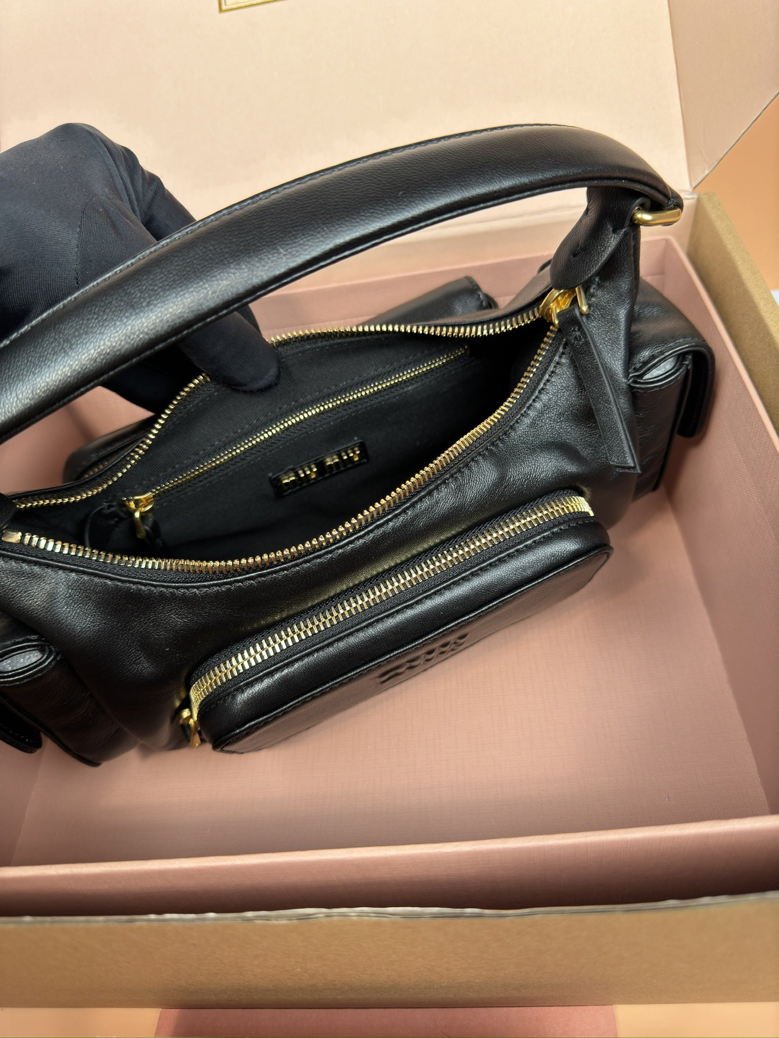 Miu Miu Hobo Nappa leather pocket bag 12x21x6cm